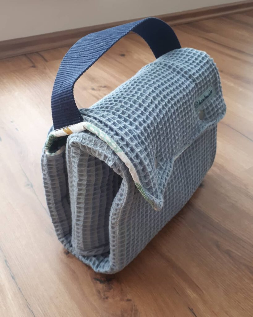 Changing pad and diaper bag