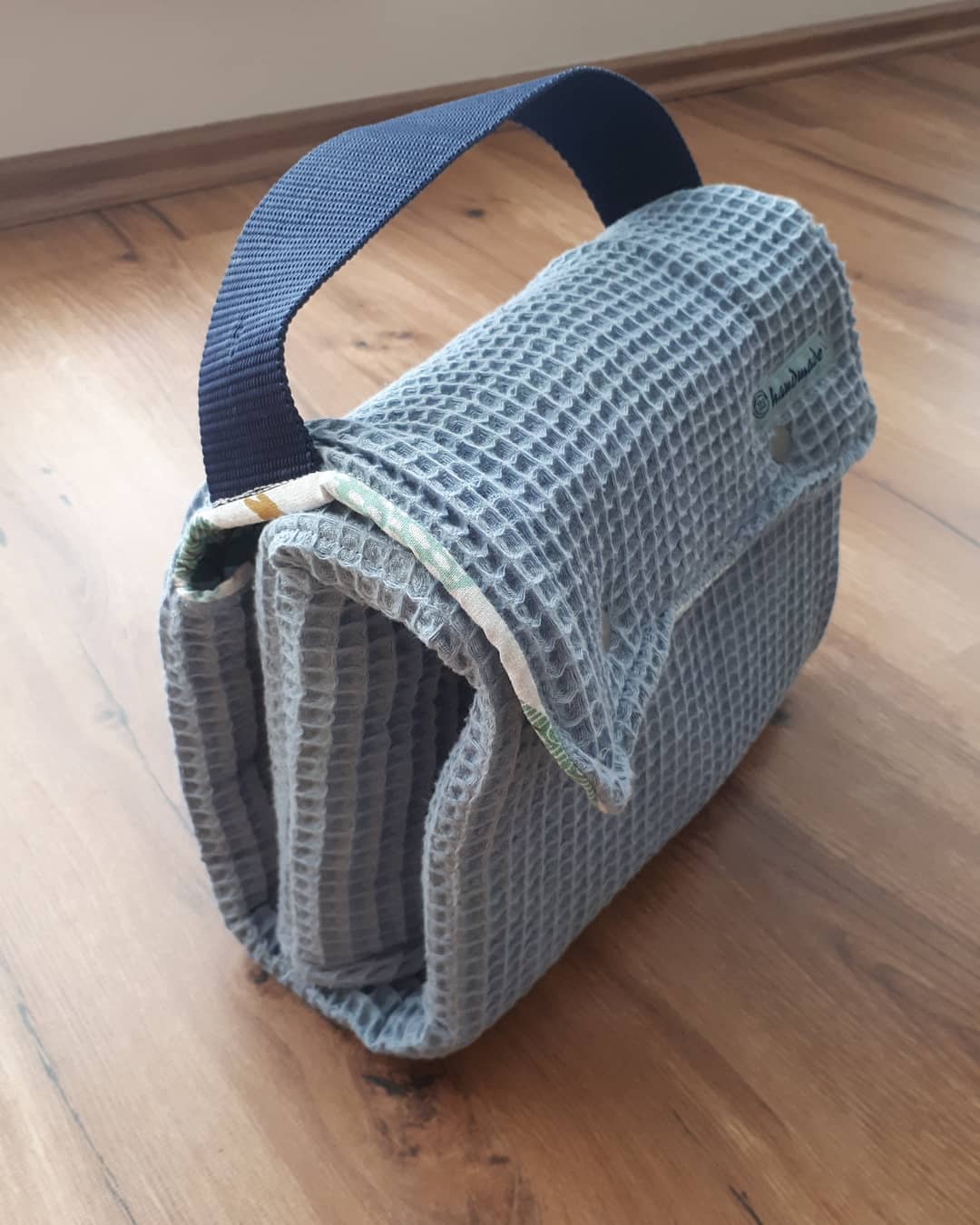 Changing pad and diaper bag