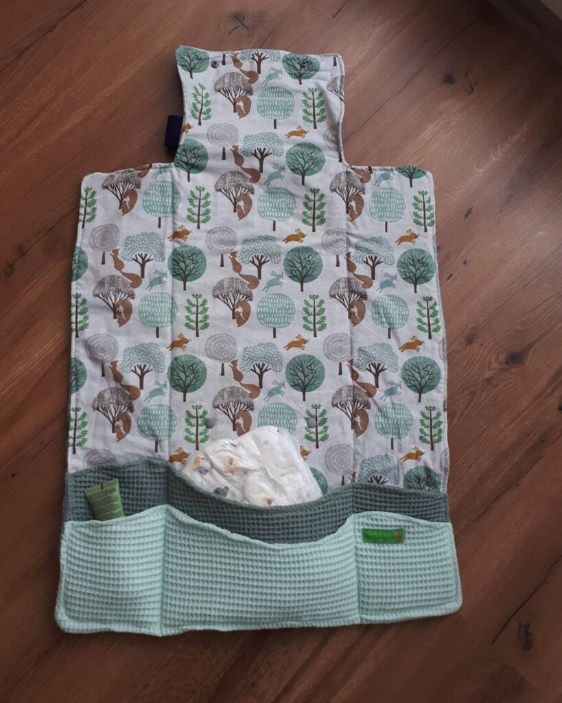 Changing pad and diaper bag
